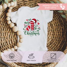 Load image into Gallery viewer, Red and green Christmas baby outfit flat lay in woven basket