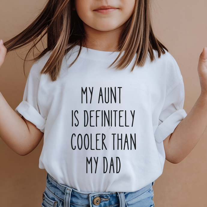 Girl in white T-shirt with My Aunt Is Definitely Cooler Than My Dad design