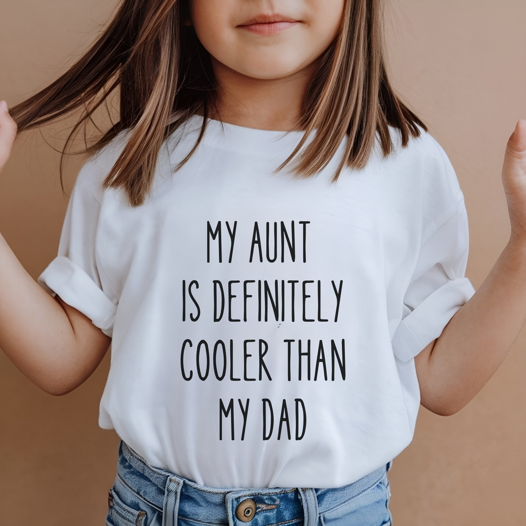 Girl in white T-shirt with My Aunt Is Definitely Cooler Than My Dad design