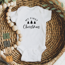 Load image into Gallery viewer, My First Christmas baby bodysuit flat lay in woven basket
